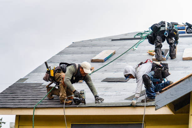Professional Gutter Installation technician working in Chino, CA